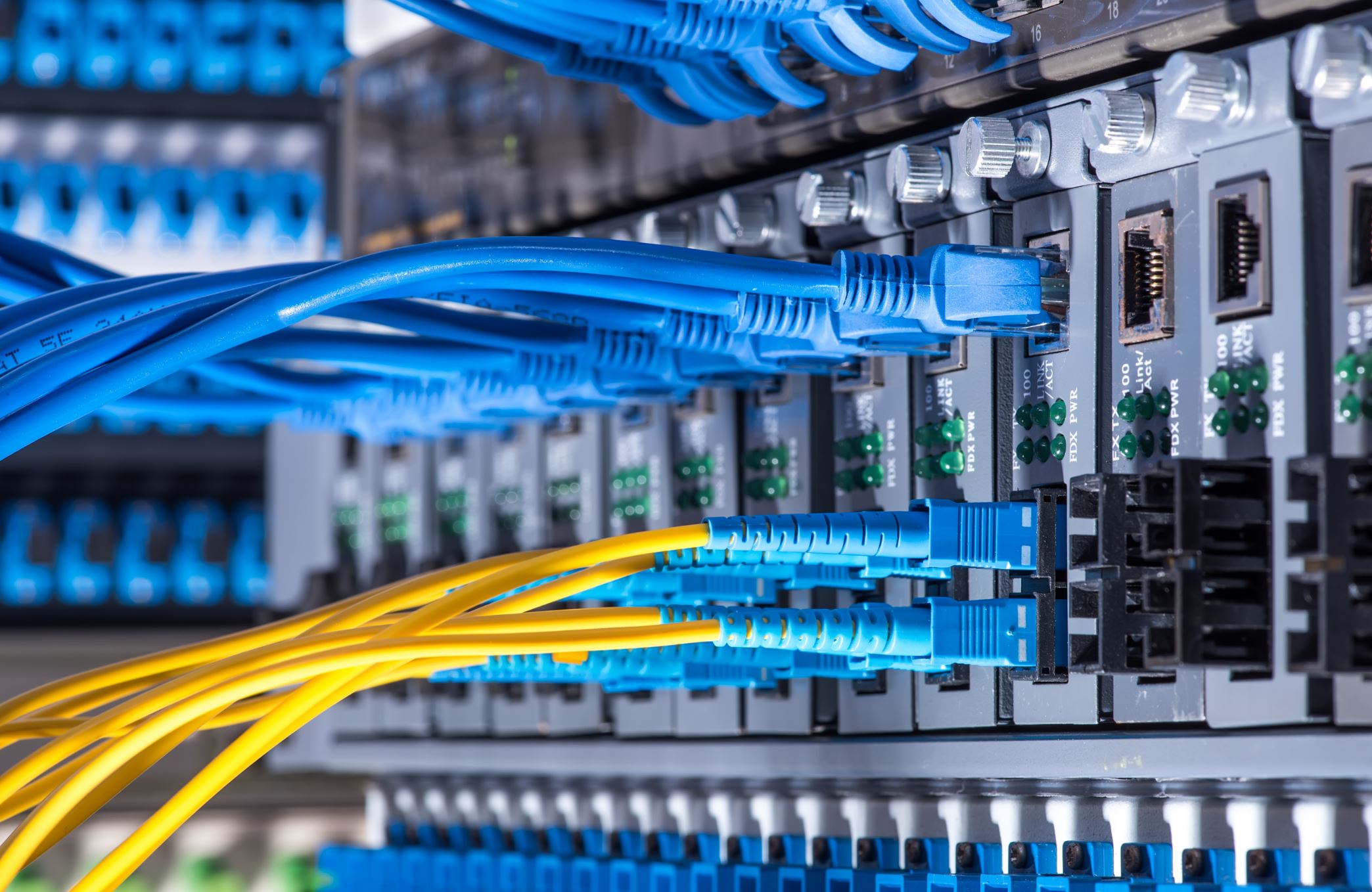 Cables connect to a computer rack