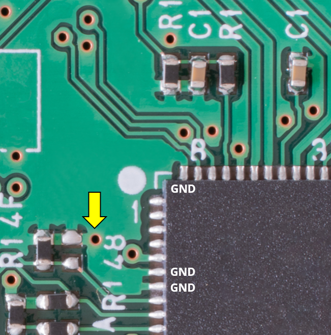 an IC with three ground pins connecting to the ground fill on Layer 1