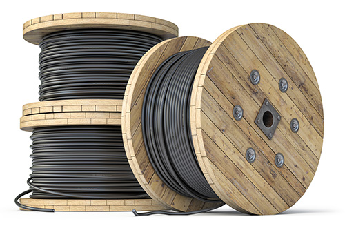Three large spools of coaxial cable