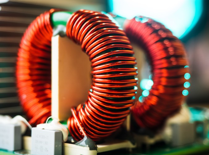 two common-mode chokes mounted on a circuit board